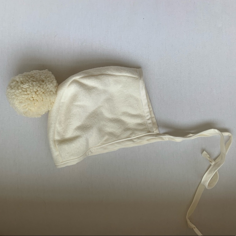 Ivory bonnet with pom